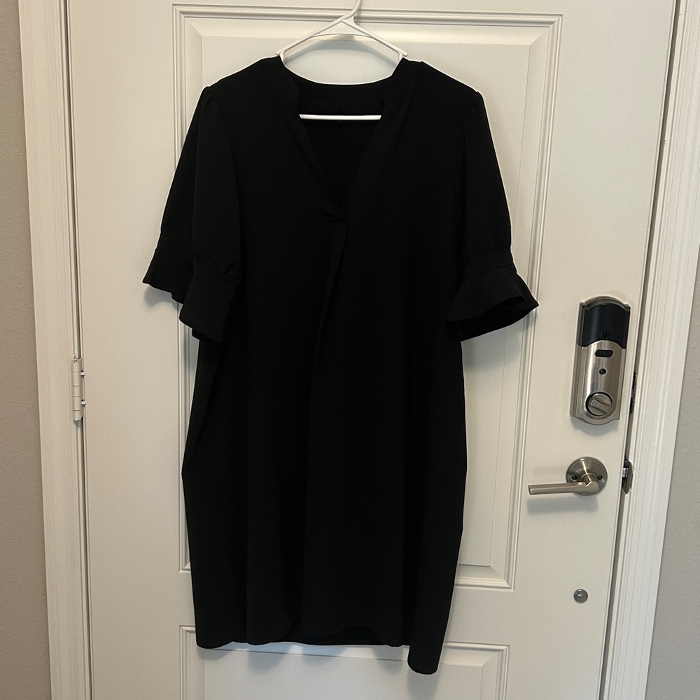 Elegant Black Dress with Ruffle Sleeves